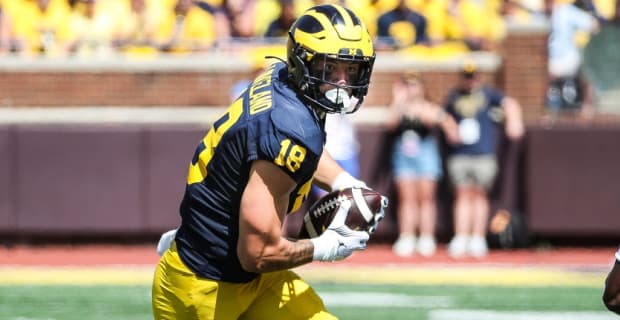 Michigan Wolverines tight end Colston Loveland catches a pass during a college football game in the Big Ten.